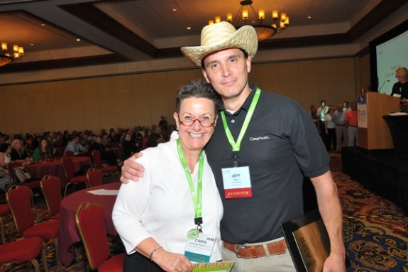 CompHealth's Jeff hugs a client at the 2013 ASPR conference