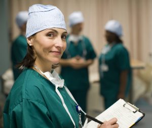 Female surgeon in operating room, portrait