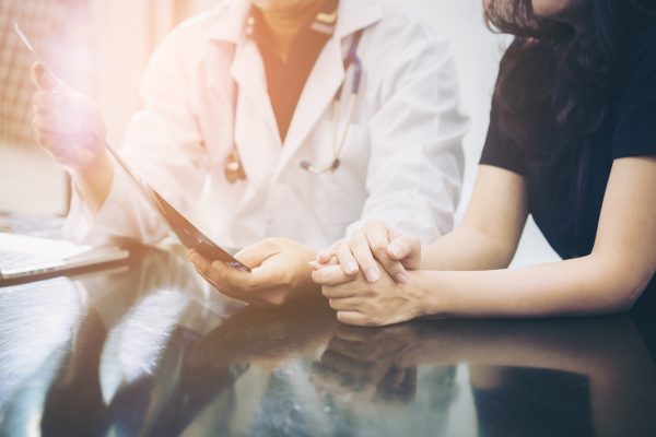 comphealth - life on a locum tenens assignment - image of doctor preparing to pass patient to a new provider