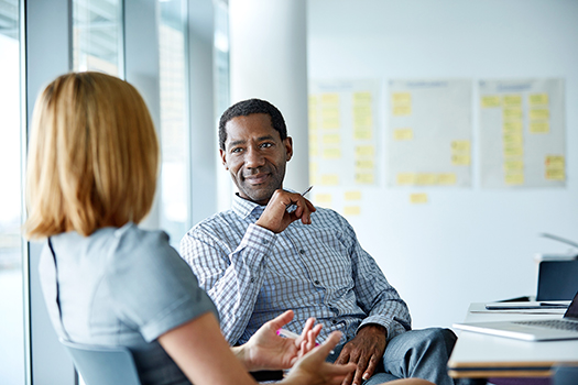 Leader listening to employee