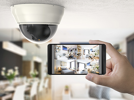 hand holding 3d rendering mobile connect with security camera in locum tenens home