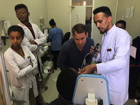 Dr. Joshua Wiedermann and residents at Mekelle University