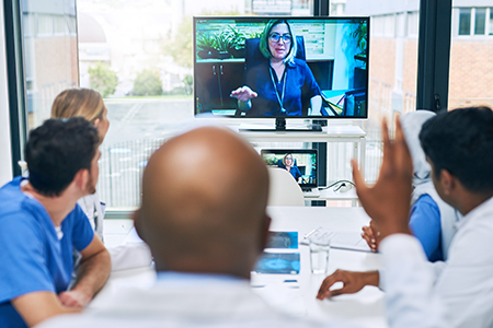 Doctors in a virtual interview