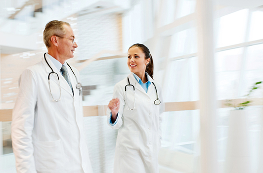 Two physicians walking together