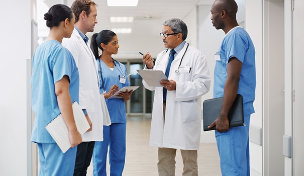 Physician and colleagues in a healthcare facility