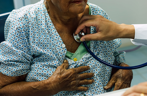 patient with NP using stethoscope