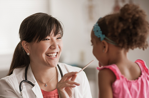 Doctor with pediatric patient