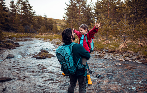 Father and daughter hiking