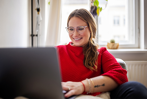 Woman typing on laptop