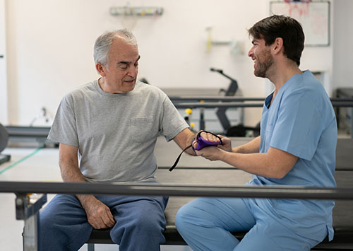 Occupational therapist at work with patient